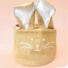 Panier en toile de jute grise avec oreilles de lapin doublées de tissu bleu et motif visage de lapin brodé – Parfait pour les fêtes de Pâques ou comme rangement décoratif.